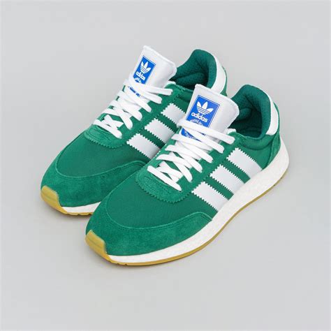 adidas green suede sneakers.